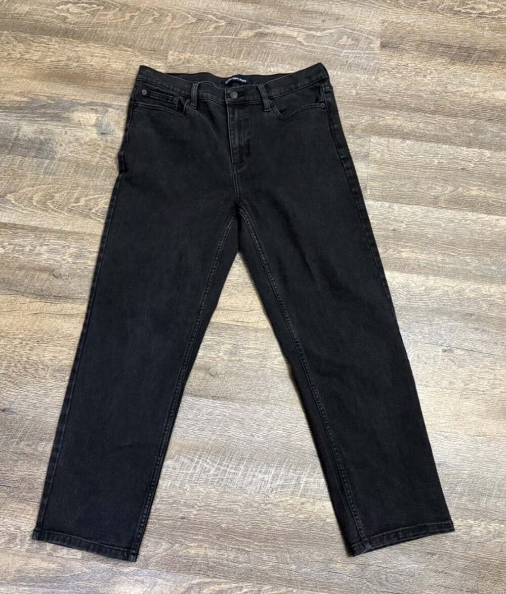 Women's Calvin Klein black denim jeans Size 12 Boot Cut High Waisted Slimming